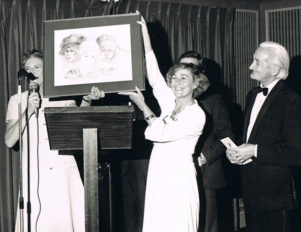 Photograph of Brownie presenting her work at the Dublin Exhibition in 1977